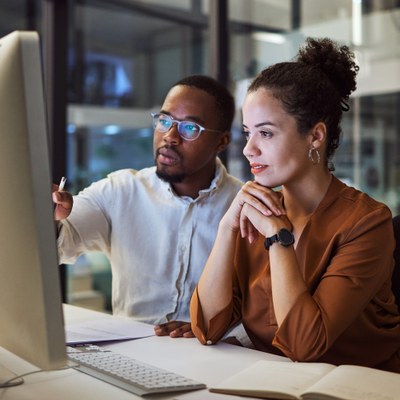 Two people at the computer